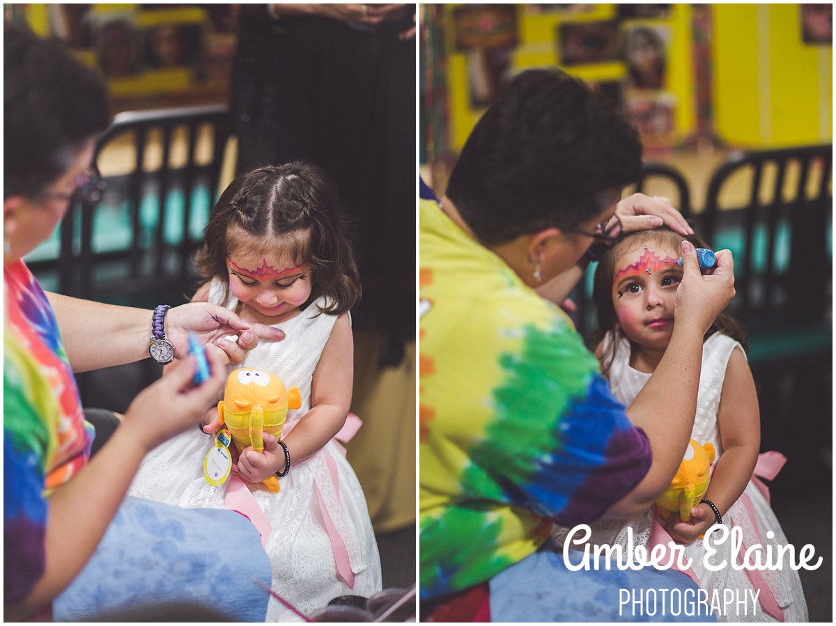 lifestyle birthday photography for girl toddler with face painting and games