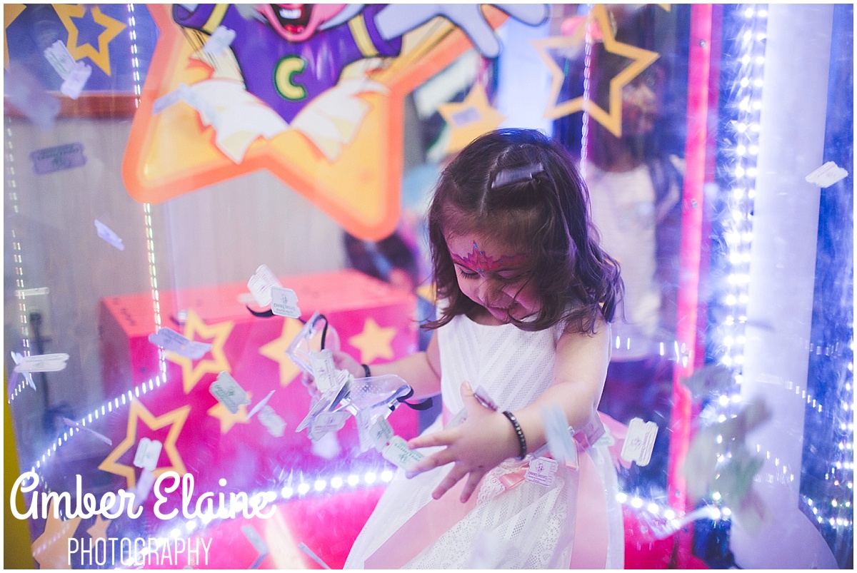 lifestyle birthday photography for girl toddler with face painting and games