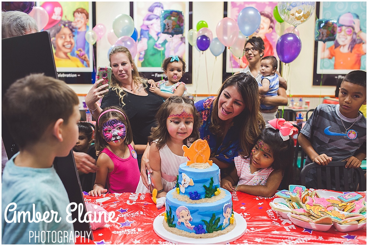 lifestyle birthday photography for girl toddler with face painting and games