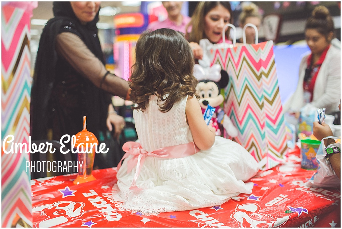 lifestyle birthday photography for girl toddler with face painting and games