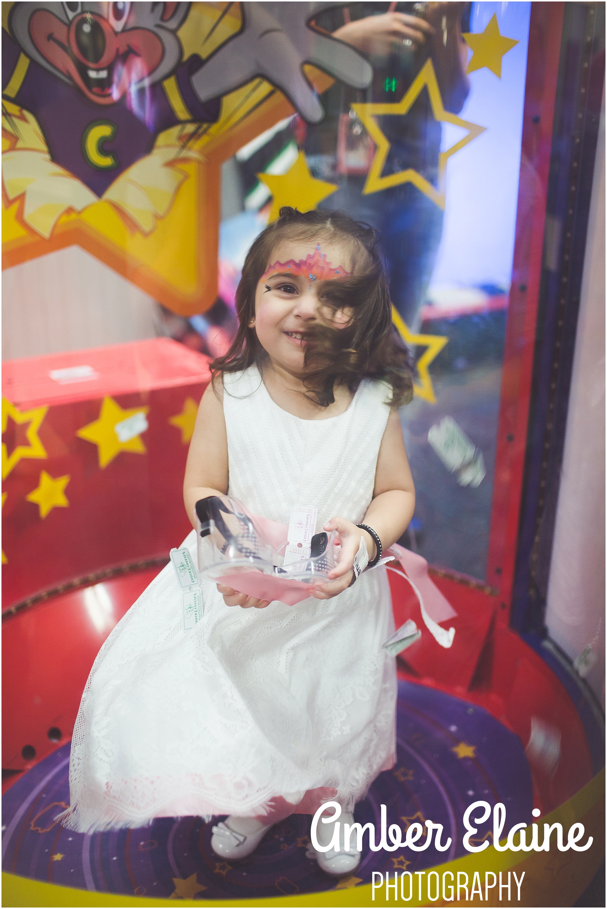 lifestyle birthday photography for girl toddler with face painting and games