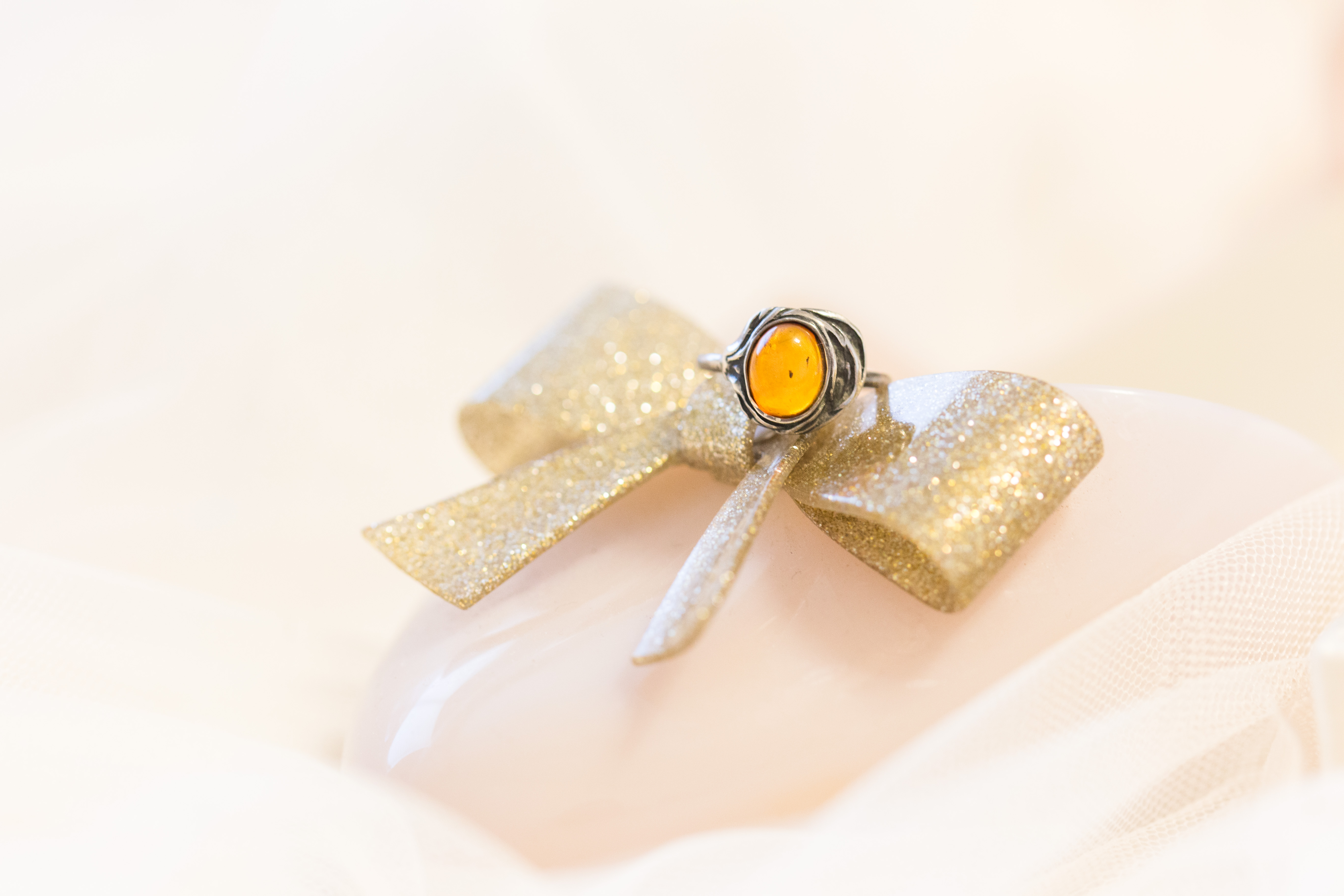 amber stone ring detail shot on melissa shoes walking on a cloud vegan flat